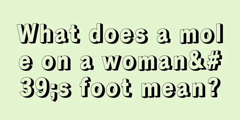 What does a mole on a woman's foot mean?