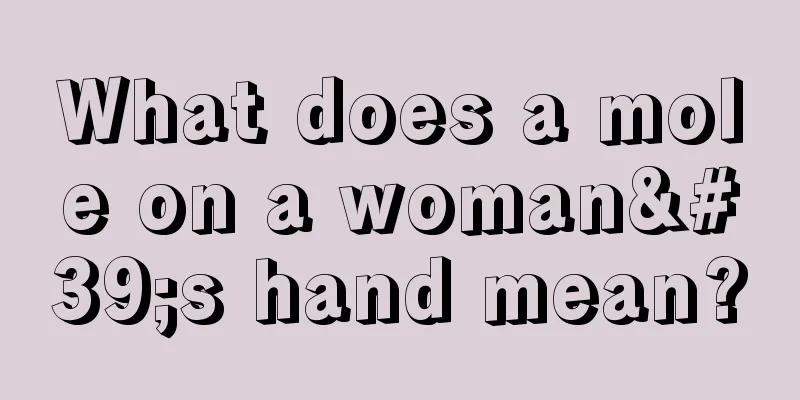 What does a mole on a woman's hand mean?