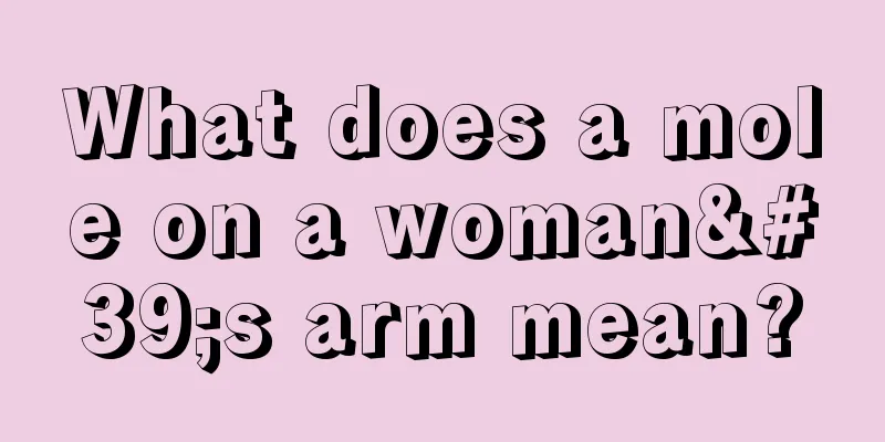 What does a mole on a woman's arm mean?