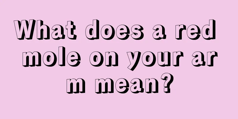 What does a red mole on your arm mean?