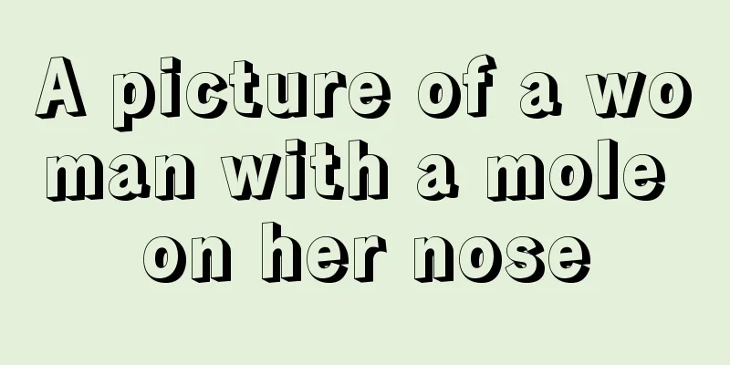 A picture of a woman with a mole on her nose