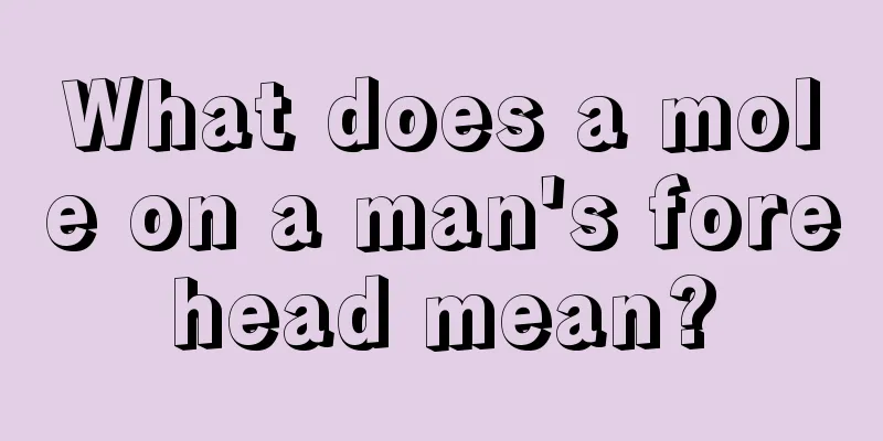What does a mole on a man's forehead mean?
