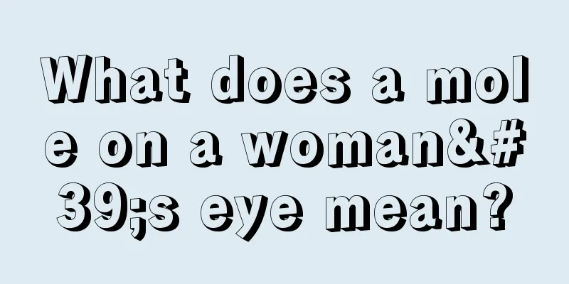 What does a mole on a woman's eye mean?