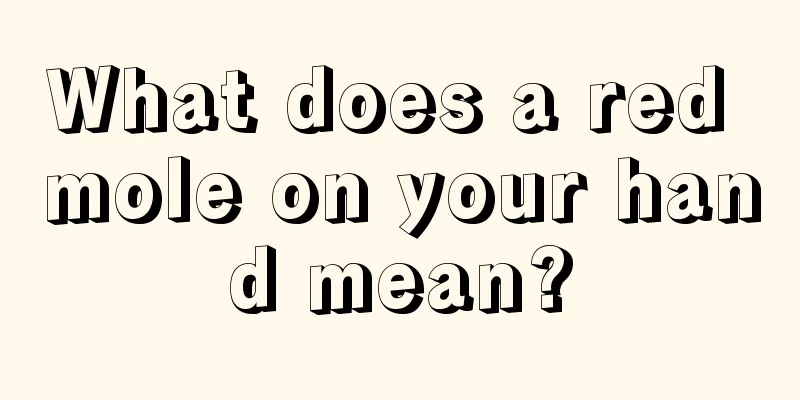 What does a red mole on your hand mean?