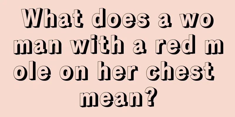 What does a woman with a red mole on her chest mean?