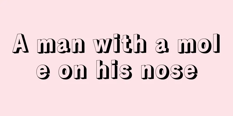 A man with a mole on his nose