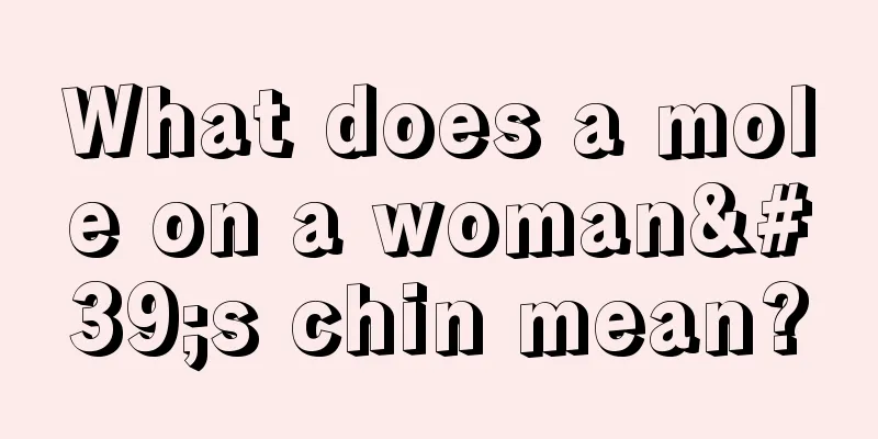 What does a mole on a woman's chin mean?