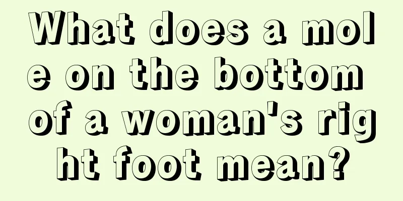 What does a mole on the bottom of a woman's right foot mean?