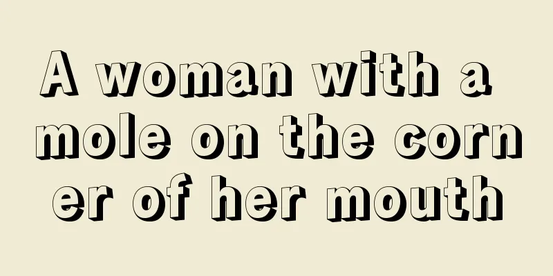 A woman with a mole on the corner of her mouth