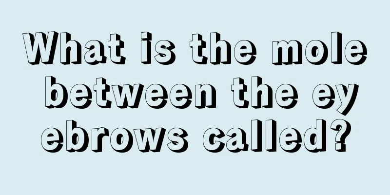 What is the mole between the eyebrows called?