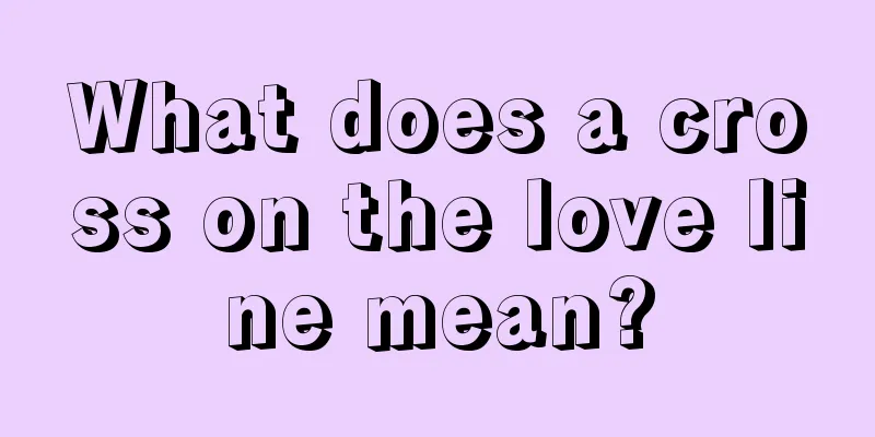What does a cross on the love line mean?