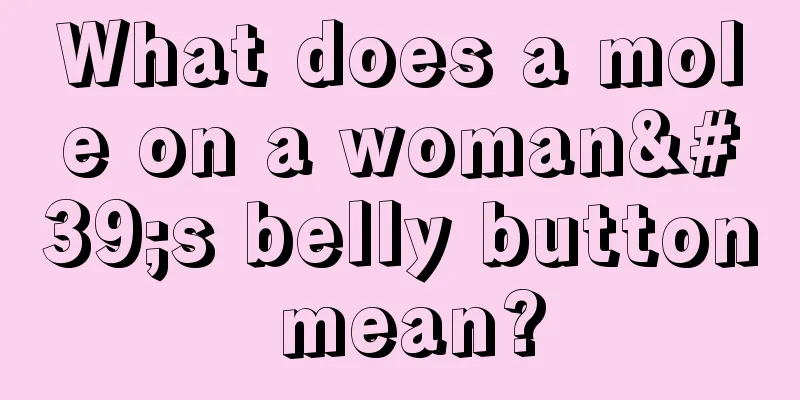 What does a mole on a woman's belly button mean?