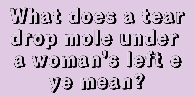 What does a teardrop mole under a woman’s left eye mean?