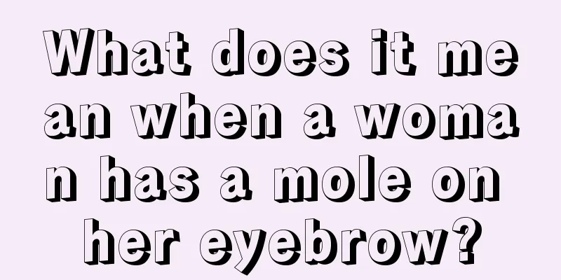 What does it mean when a woman has a mole on her eyebrow?