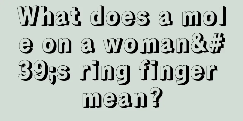 What does a mole on a woman's ring finger mean?