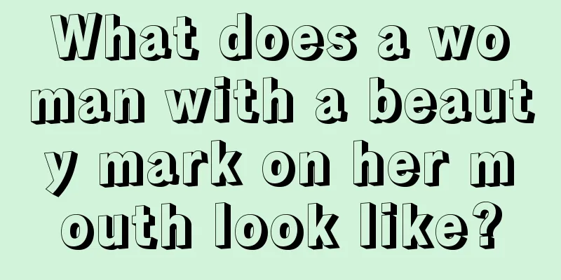 What does a woman with a beauty mark on her mouth look like?