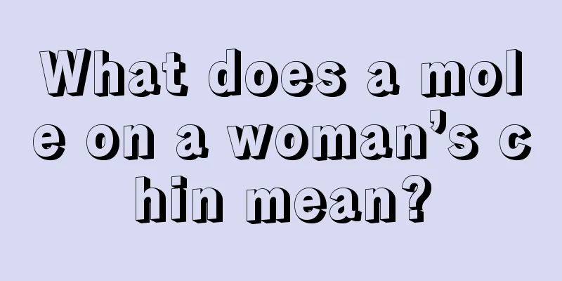 What does a mole on a woman’s chin mean?