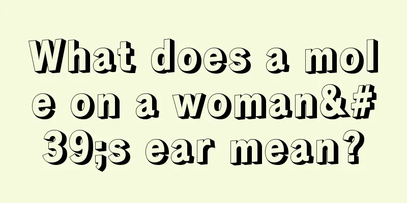 What does a mole on a woman's ear mean?
