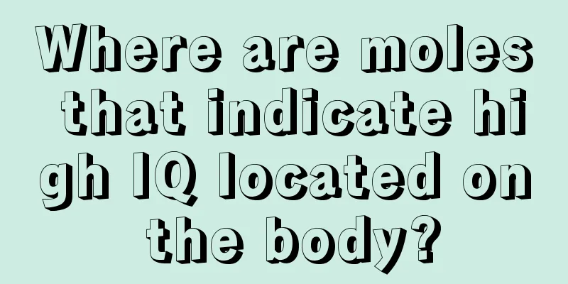 Where are moles that indicate high IQ located on the body?