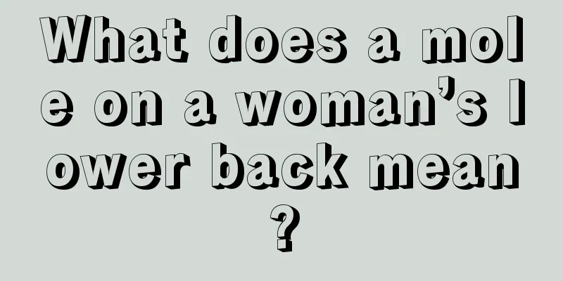 What does a mole on a woman’s lower back mean?