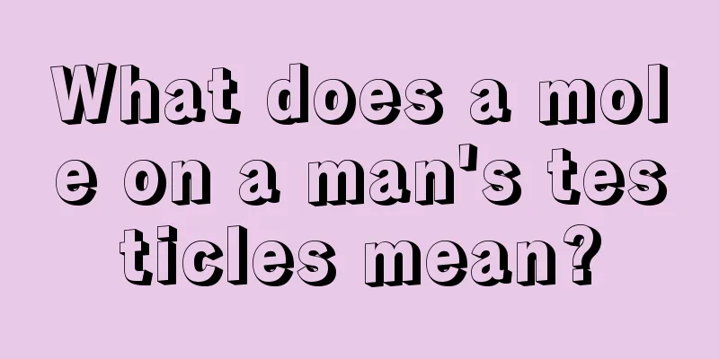 What does a mole on a man's testicles mean?