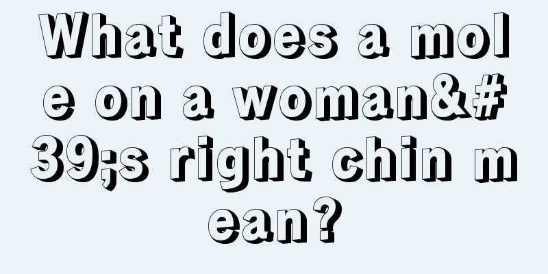 What does a mole on a woman's right chin mean?
