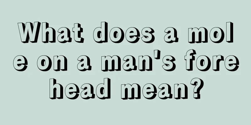 What does a mole on a man's forehead mean?