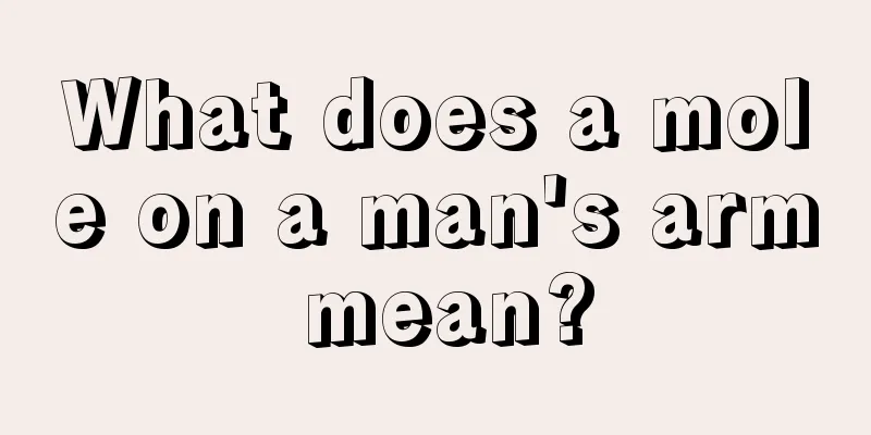 What does a mole on a man's arm mean?