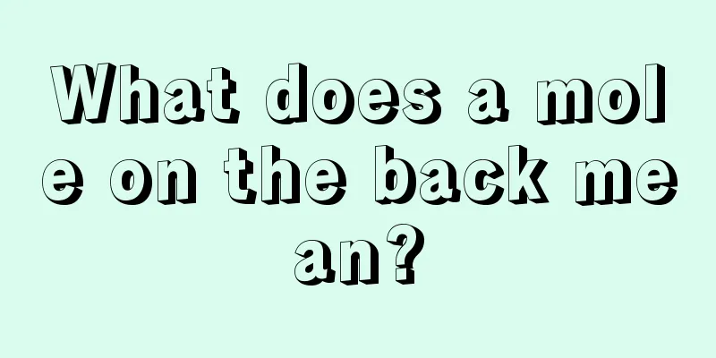 What does a mole on the back mean?