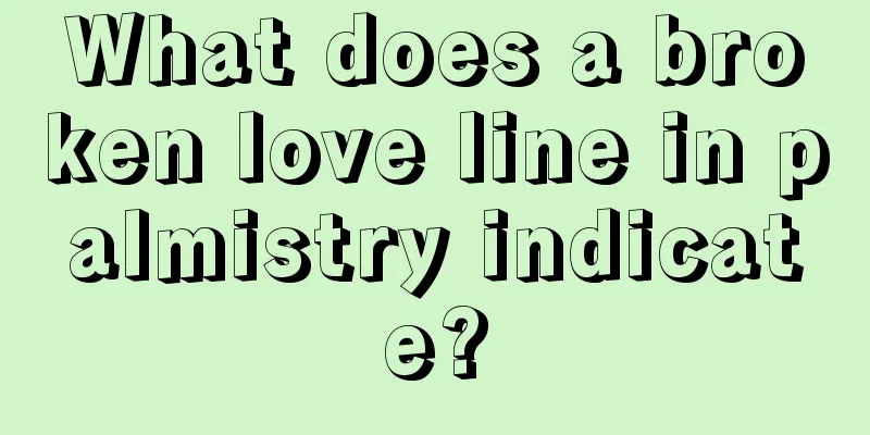 What does a broken love line in palmistry indicate?
