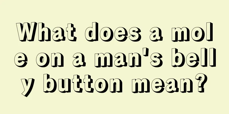 What does a mole on a man's belly button mean?