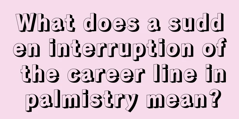 What does a sudden interruption of the career line in palmistry mean?