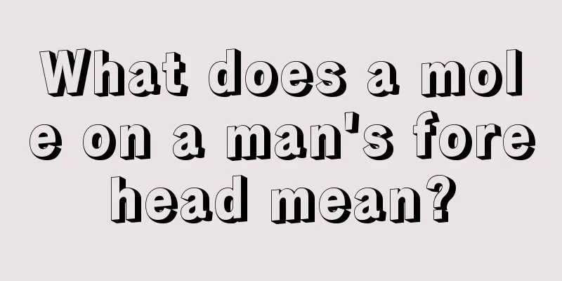 What does a mole on a man's forehead mean?