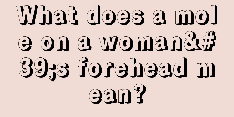 What does a mole on a woman's forehead mean?