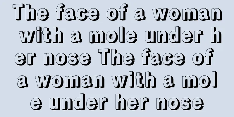 The face of a woman with a mole under her nose The face of a woman with a mole under her nose