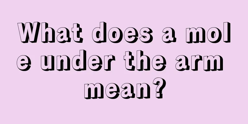 What does a mole under the arm mean?