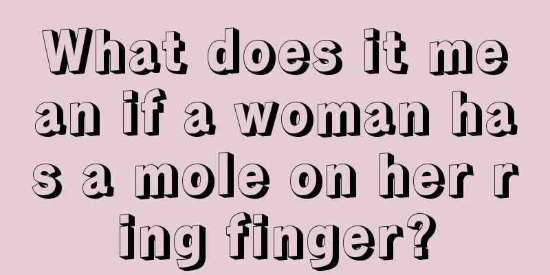 What does it mean if a woman has a mole on her ring finger?