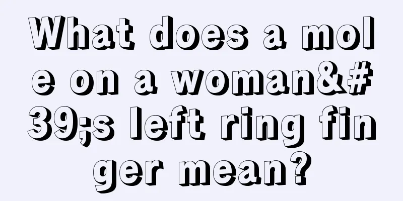 What does a mole on a woman's left ring finger mean?