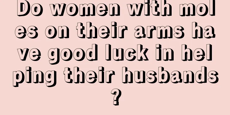 Do women with moles on their arms have good luck in helping their husbands?
