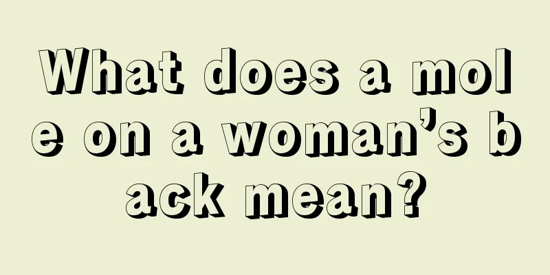What does a mole on a woman’s back mean?