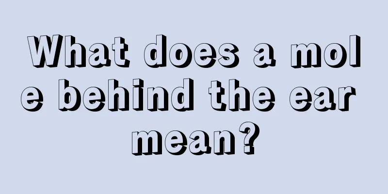 What does a mole behind the ear mean?