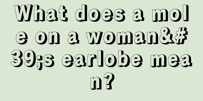 What does a mole on a woman's earlobe mean?