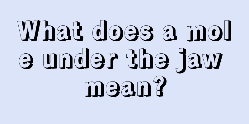 What does a mole under the jaw mean?