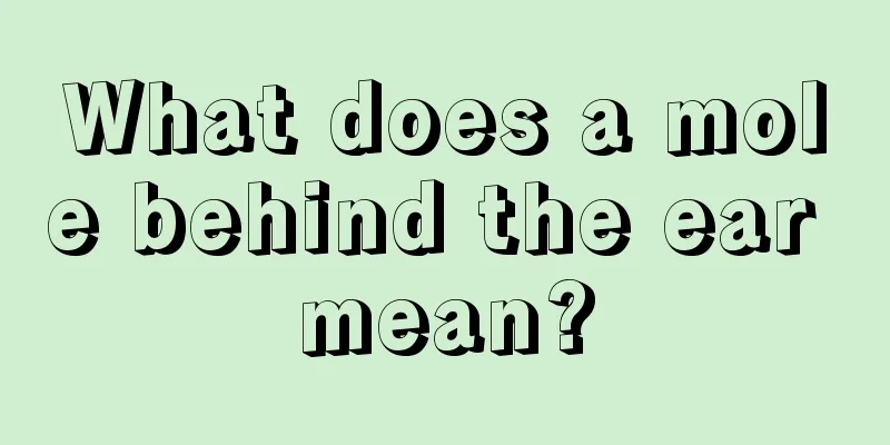 What does a mole behind the ear mean?