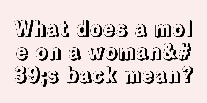 What does a mole on a woman's back mean?