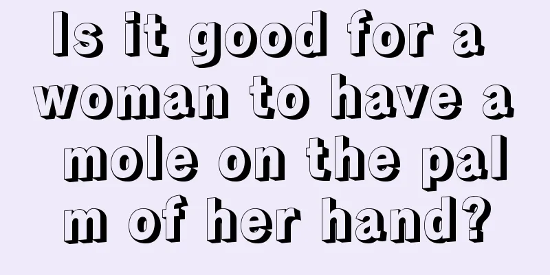 Is it good for a woman to have a mole on the palm of her hand?
