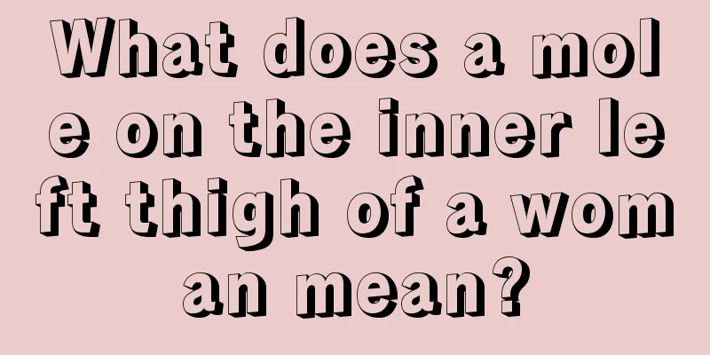 What does a mole on the inner left thigh of a woman mean?