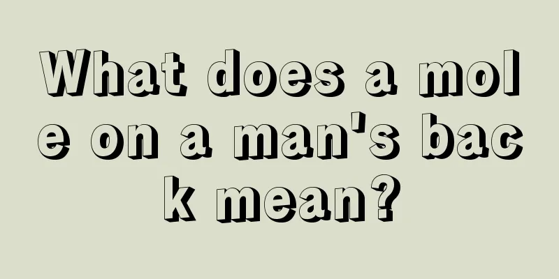 What does a mole on a man's back mean?