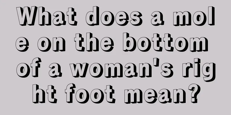 What does a mole on the bottom of a woman's right foot mean?
