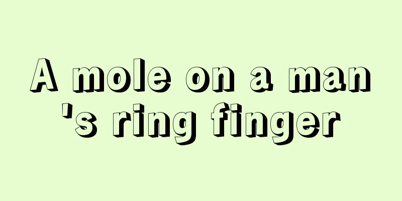 A mole on a man's ring finger